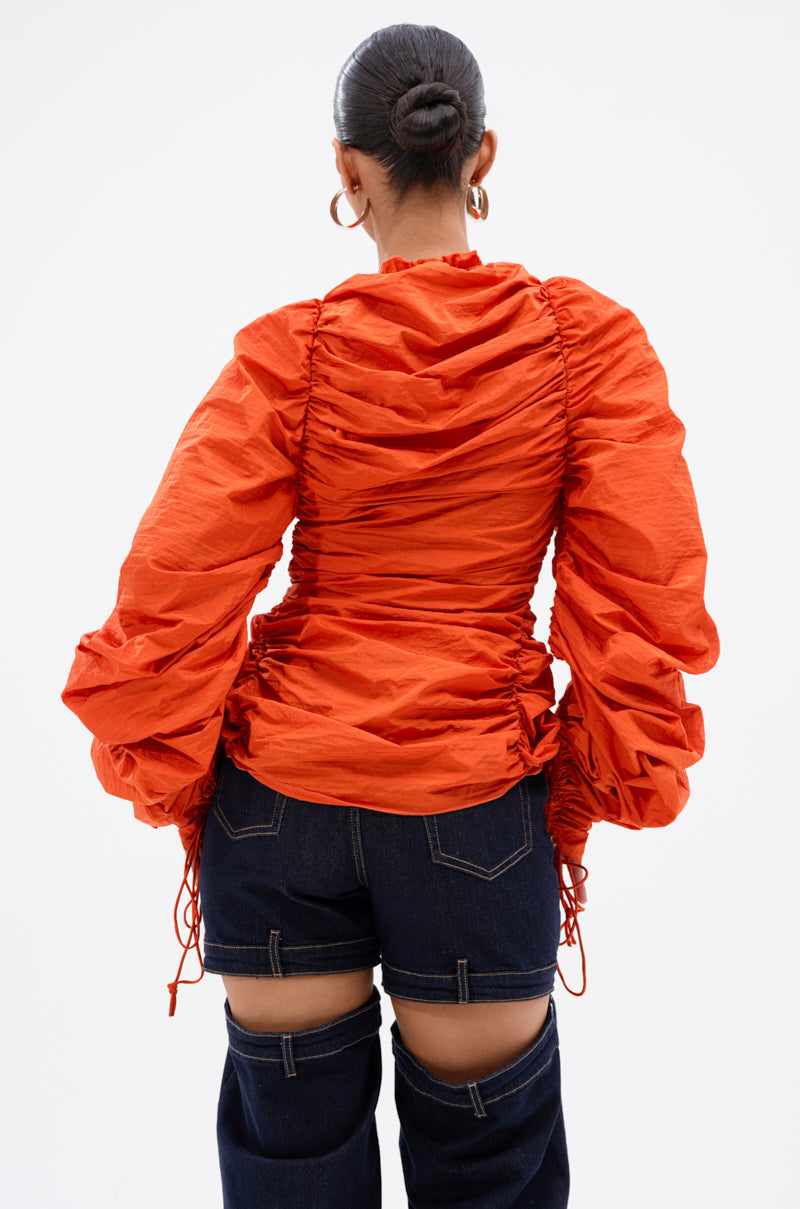 IN IT TO WIN IT RUCHED BLOUSE